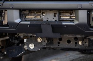 Ford Bronco License Plate Relocation Bracket - Front - DV8 Offroad - Micro-Texture Black Powder Coat - `21-`22