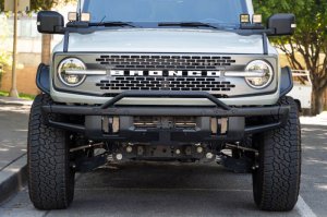 Ford Bronco License Plate Relocation Bracket - Front - DV8 Offroad - Micro-Texture Black Powder Coat - `21-`22